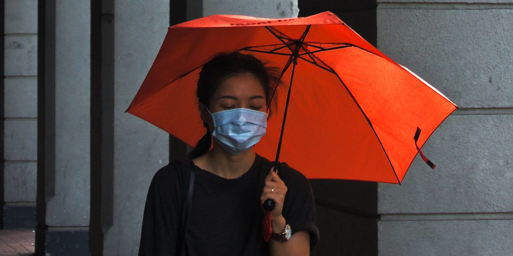 Woman wearing mask.