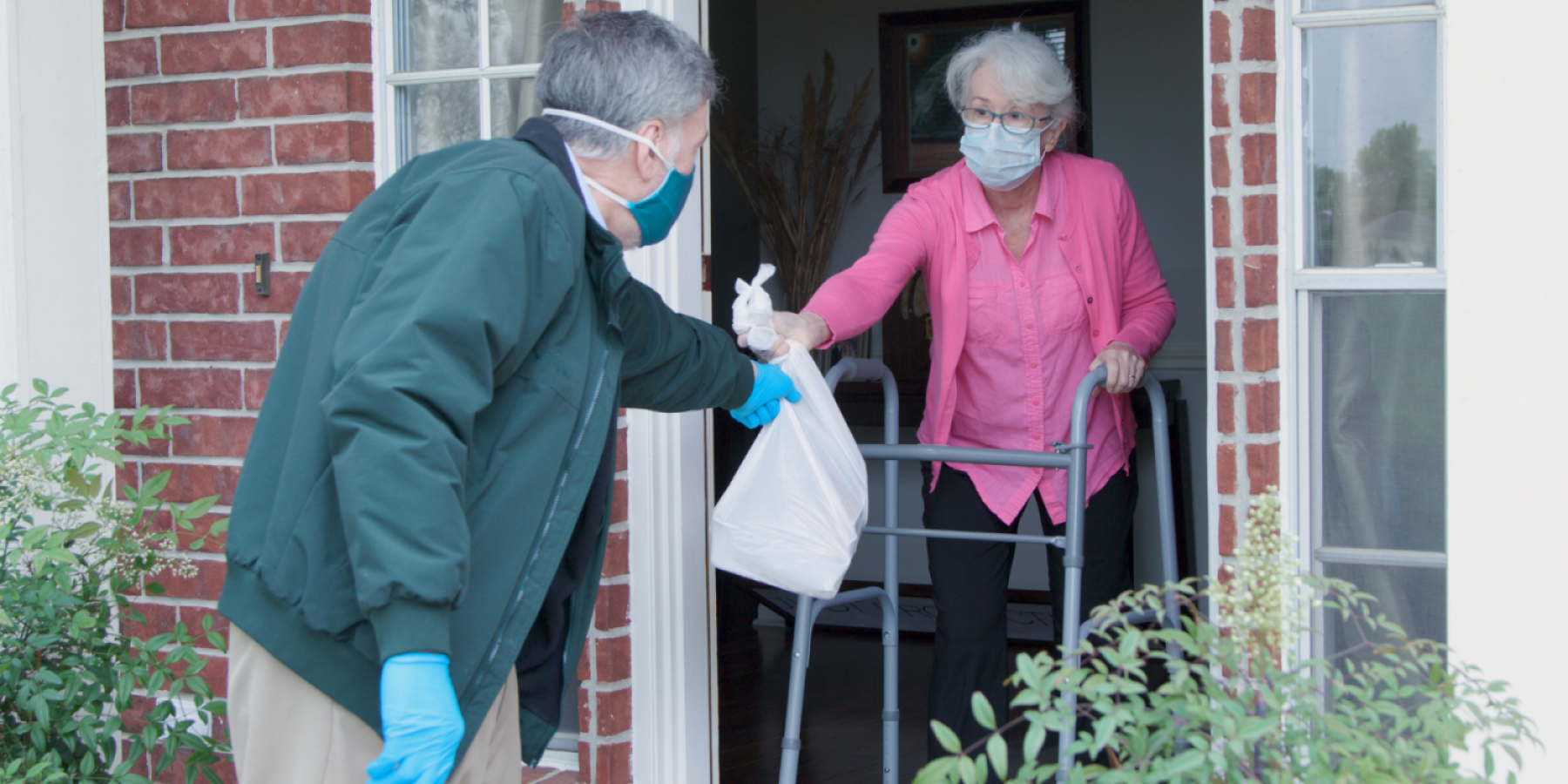 Woman getting groceries during COVID-19