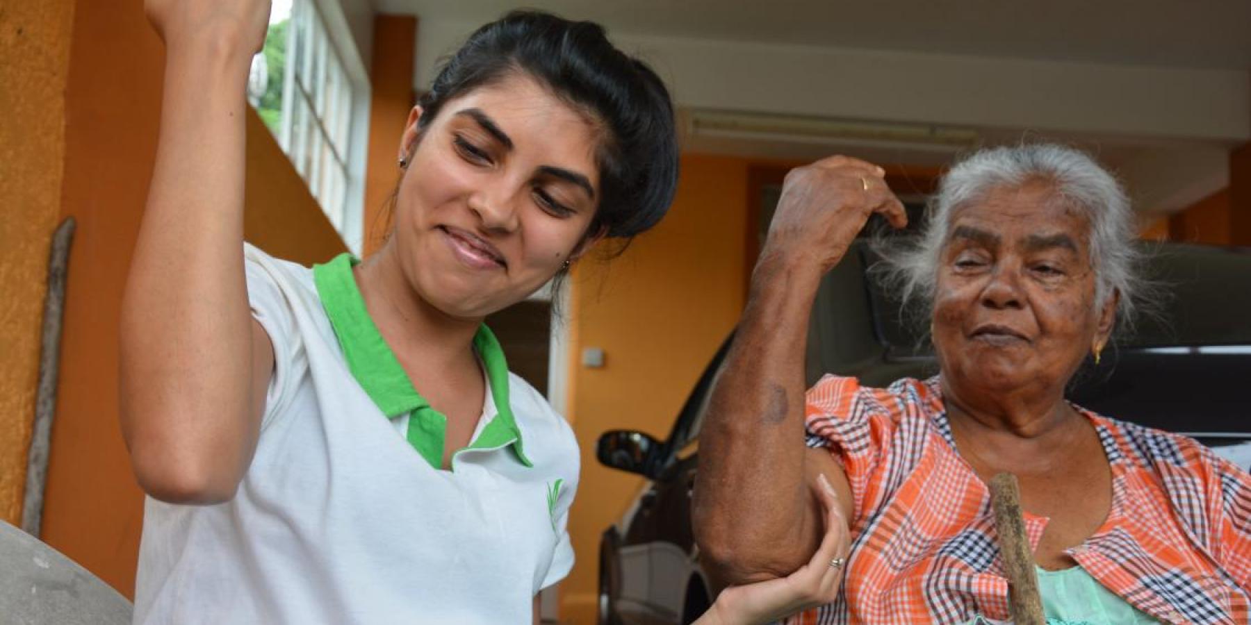 Occupational Therapist Karishma works with one of her patients in Bon Acceuil, Mauritius. 