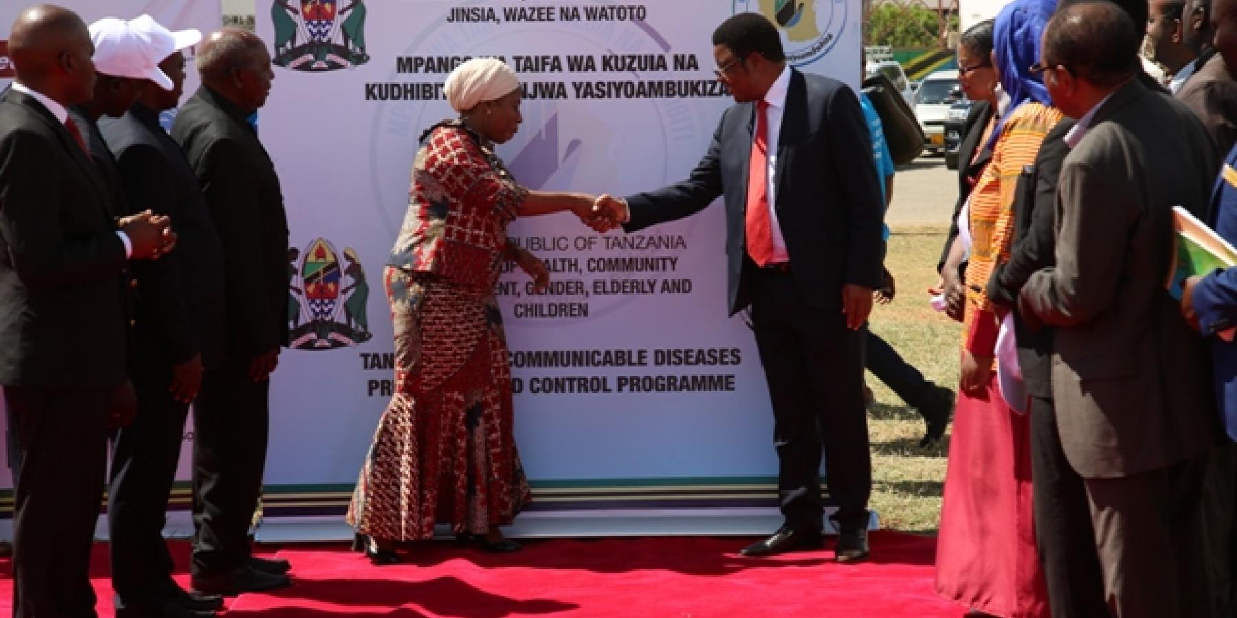 Tanzania Prime Minister Kassim Majaliwa congratulating the Minister of Health, Hon Ummy Mwalimu