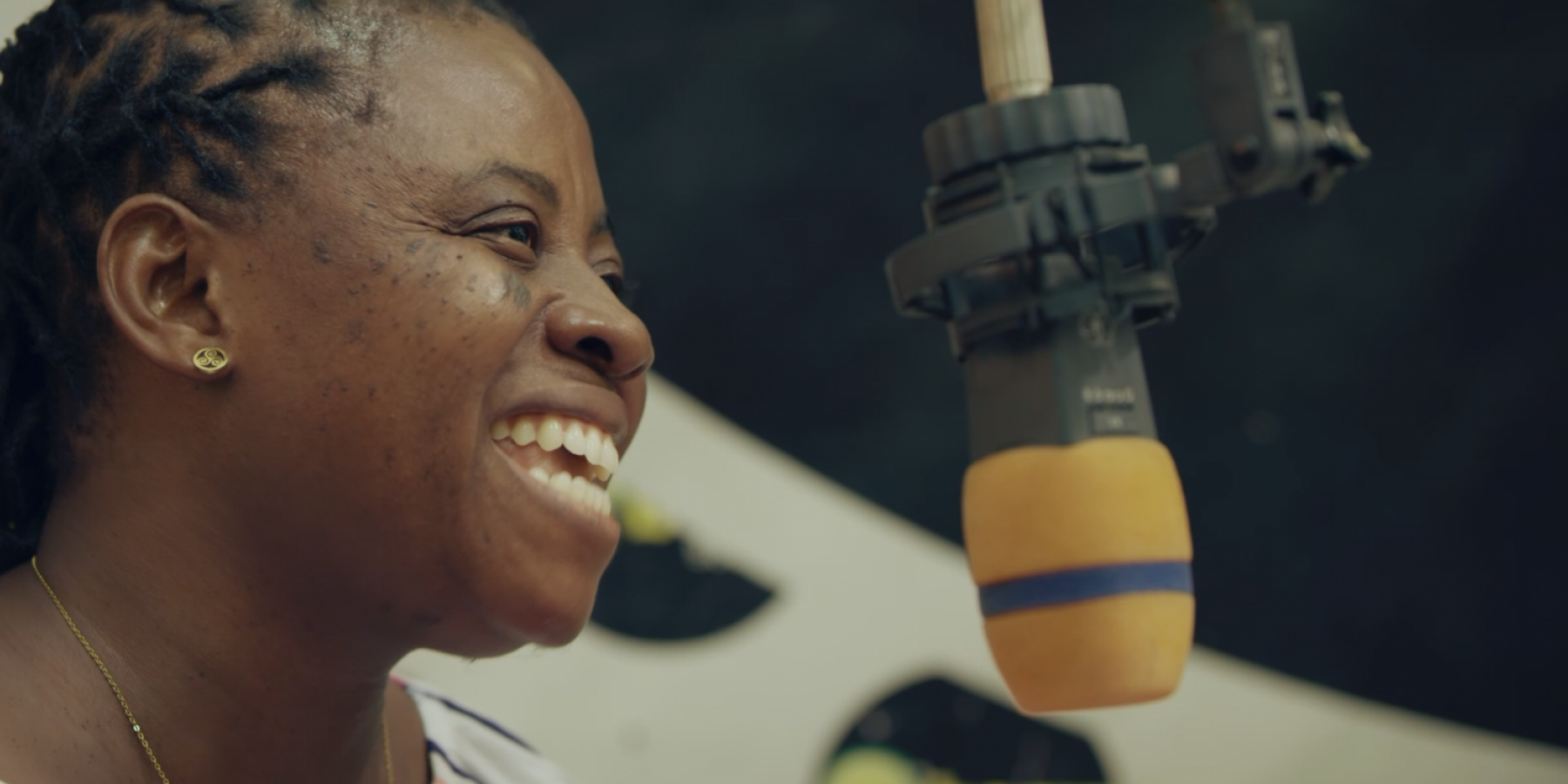 Martha Coffie, Vice President, Mental Health Society of Ghana. she speaks at a local radio station as part of the mini-film 'Stopping the Stigma'.