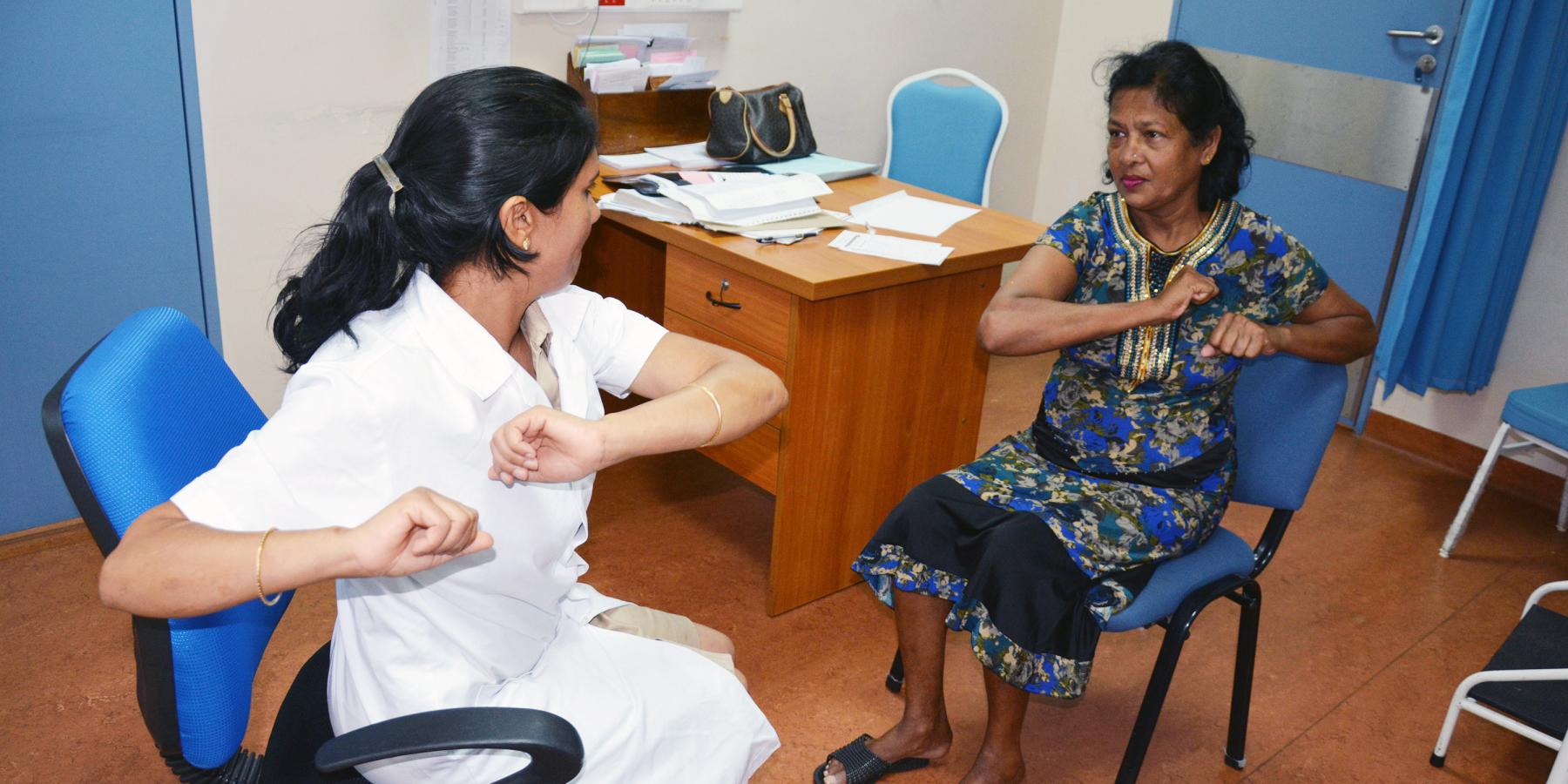 A diabetic specialist nurse teaches about insulin