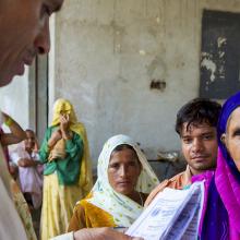 Indian senior patient queuing to have a free medical consultation in Agra, India 2010